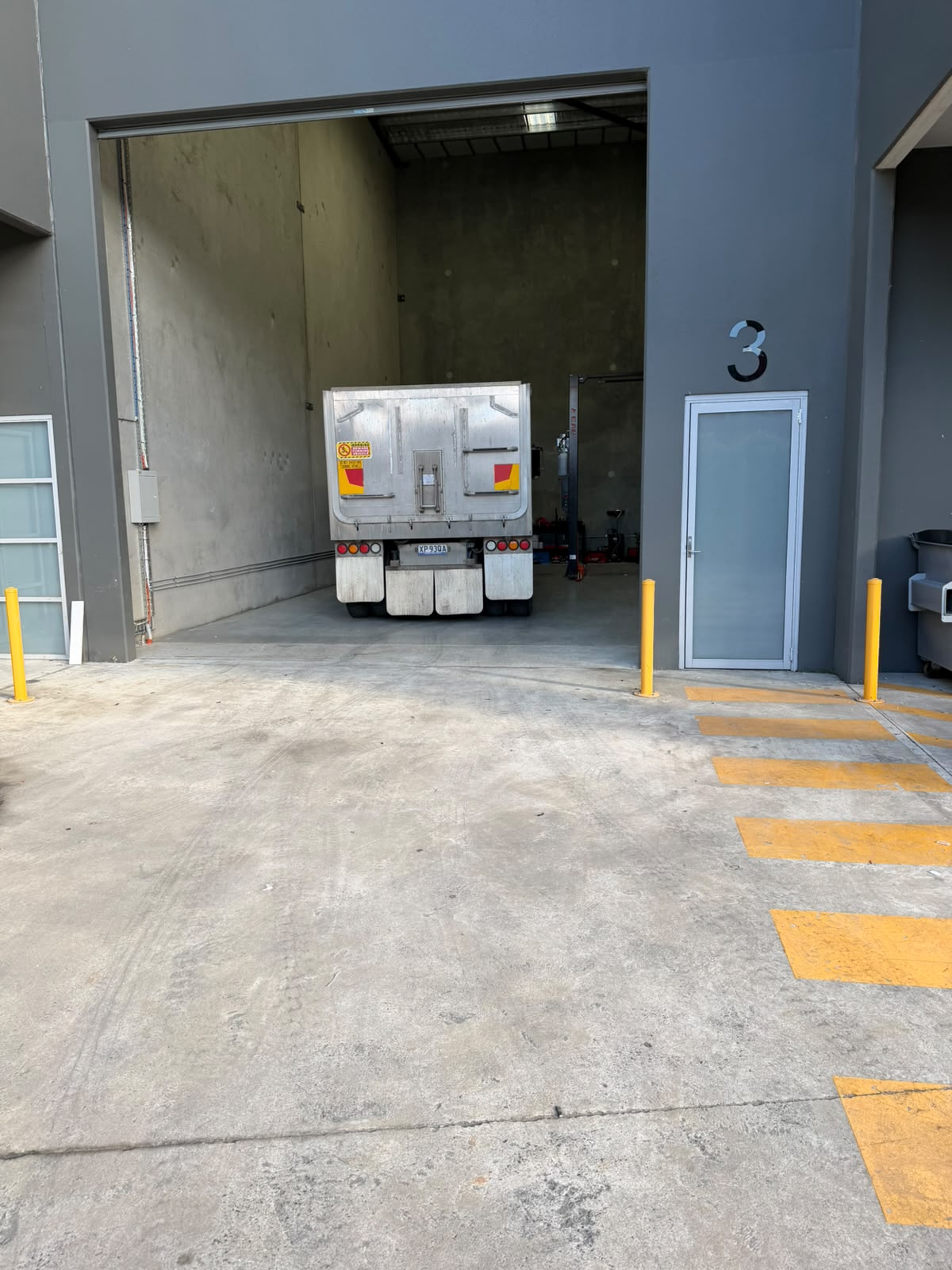 Axie Autoworks workshop roller door in Yennora